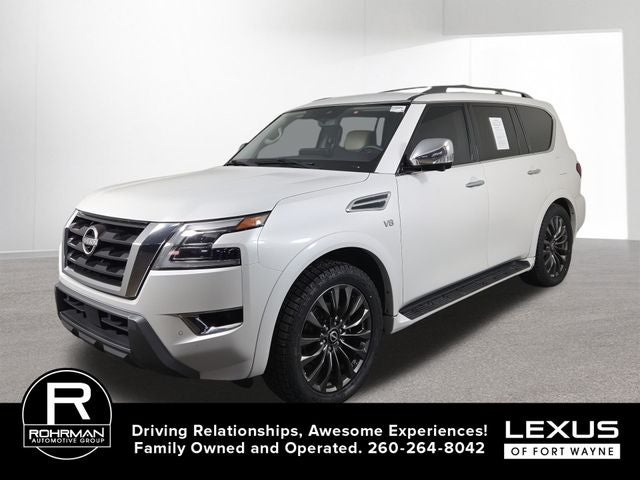 2022 Nissan Armada Platinum in Aspen White Tricoat — front three-quarter view