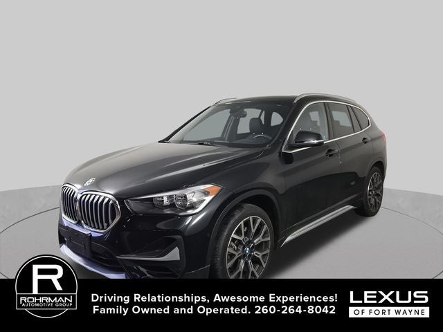 2022 BMW X1 xDrive28i in Black Sapphire Metallic — front three-quarter view